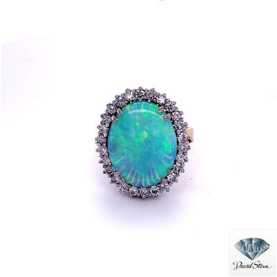 4.00 CT Oval Opal Cabochon Couture Ring in 14kt White Gold and 14kt Yellow Gold.