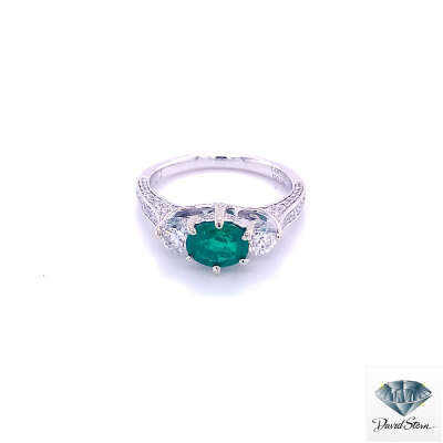 0.75 CT Oval Emerald Faceted Fashion Ring in 14kt White Gold.